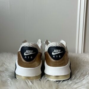 Nike Air Sneakers with Gold and Black Details